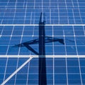 Grid Shadow - Pylon Casts Shadow on Solar Panel Royalty Free Stock Photo