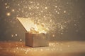 Starlight blowout from gift box. magic shining of christmas gift. By generative Ai Royalty Free Stock Photo