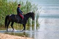 STAROCHERKASSK, RUSSIA - CIRCA SEPTEMBER 2020: a young Don Cossack on horseback Royalty Free Stock Photo