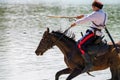 STAROCHERKASSK, RUSSIA - CIRCA SEPTEMBER 2020: a young Don Cossack on horseback Royalty Free Stock Photo