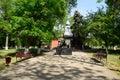 Monument in honor of victory in the Second World War. An artillery cannon and a building with pots of earth from battle sites.