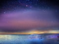 Starry blue night sky at sea sunset background