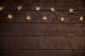 Starry Christmas lights on a gray wooden background