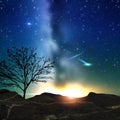 Starry night blue sky and orange  sunset beam flares   milky way nature landscape Royalty Free Stock Photo