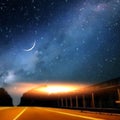 Starry night blue sky and orange  sunset beam flares   milky way nature landscape Royalty Free Stock Photo