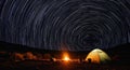 Starry Night Camping Scene with Campfire Royalty Free Stock Photo