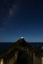 Starry night at Nugget Point Lighthouse, New Zealand, under the Milky Way Royalty Free Stock Photo