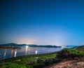 Starry night over Porto Conte bay, Sardinia Royalty Free Stock Photo