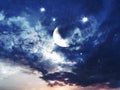 Ocean   Blue night  starry sky  moon on sunset fluffy dramatic clouds at  water wave reflection at sea nature landscape background Royalty Free Stock Photo