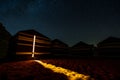 Starry night sky over the desert camp in Wadi Rum, Jordan Royalty Free Stock Photo