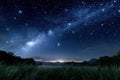 Starry Night Sky Over Lush Grass Field Royalty Free Stock Photo