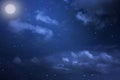 Starry night sky with stars and moon in cloudscape background Royalty Free Stock Photo