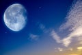 Starry sky with half moon in scenic cloudscape . Royalty Free Stock Photo