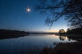 Starry sky at the lake at twilight Royalty Free Stock Photo