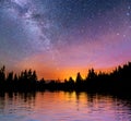 Starry sky over the sea. Fantastic Milky Way. Meteor shower Royalty Free Stock Photo