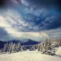 Starry sky in winter snowy night. Carpathians, Ukraine, Europe Royalty Free Stock Photo