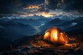 Starry summit camping Tent pitched high, immersed in mountainous nocturnal grandeur