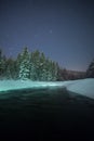 Starry winter night in a river