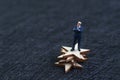 5 stars business, success winning or excellence satisfaction concept, miniature figure confidence businessman standing on stack of