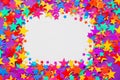 Stars confetti on a purple background, frame Royalty Free Stock Photo