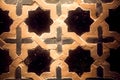 Stars and crosses on tile mosaic panel with traditional patterns, made in 16th century, Spain