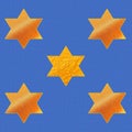 Stars of David on blue fabric background Royalty Free Stock Photo