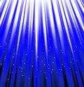 Stars are falling on the background of blue rays. Royalty Free Stock Photo