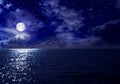 Stars, full moon over the sea at night Royalty Free Stock Photo