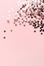 Stars glitter scattered on pink pastel background