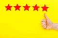 5 stars increase rating, customer experience concept. Hand of client show putting 5 star symbol to increase Service rating. five Royalty Free Stock Photo