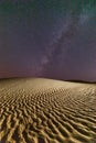 Stars over a sand dune in the desert of Oman