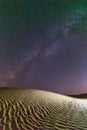 Stars over a sand dune in the desert of Oman