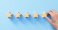 5 stars rating review, best quality products and services concept with customer giving feedback. Client satisfaction, reputation