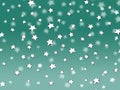 Stars trickle like snow from the sky against a green background