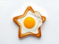 Starshaped fried egg on a white background Royalty Free Stock Photo