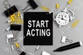 Start Acting - concept of text on sticky note. Work and study concept Royalty Free Stock Photo