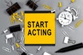 Start Acting - concept of text on sticky note. Work and study concept Royalty Free Stock Photo
