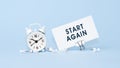 Start Again - concept of text on business card. Work and study concept Royalty Free Stock Photo