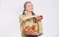 Start apple diet. Woman carry basket with natural fruits. Farmer gardener apples harvest. Girl gardener rustic style