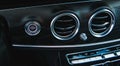 Start button engine and car ventilation grille air conditioning Royalty Free Stock Photo