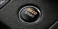 2020 Start Button Illuminated Start Engine Button with Year 2020 on Black Leather Material Royalty Free Stock Photo