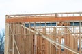 start of construction of a new house work timber frame material Royalty Free Stock Photo