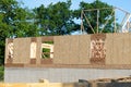 start of construction of a plywood house new home work real Royalty Free Stock Photo