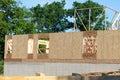 start of construction of a plywood house new home work real Royalty Free Stock Photo