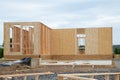 start of construction of a plywood house new wall material Royalty Free Stock Photo