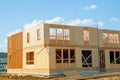 start of construction of plywood house real new wall wood material frame stud labor Royalty Free Stock Photo