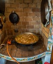 Start cooking and fry with rabbit, chicken and rice with the water already cooking to cook an authentic Valencian paella in a