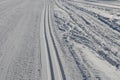 Start of the cross country skiing route. The tracks are prepared by a snowmobile with special attachments for pushing the track in Royalty Free Stock Photo