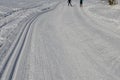 Start of the cross country skiing route. The tracks are prepared by a snowmobile with special attachments for pushing the track in Royalty Free Stock Photo