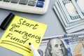 Start an Emergency Fund. Money and calculator